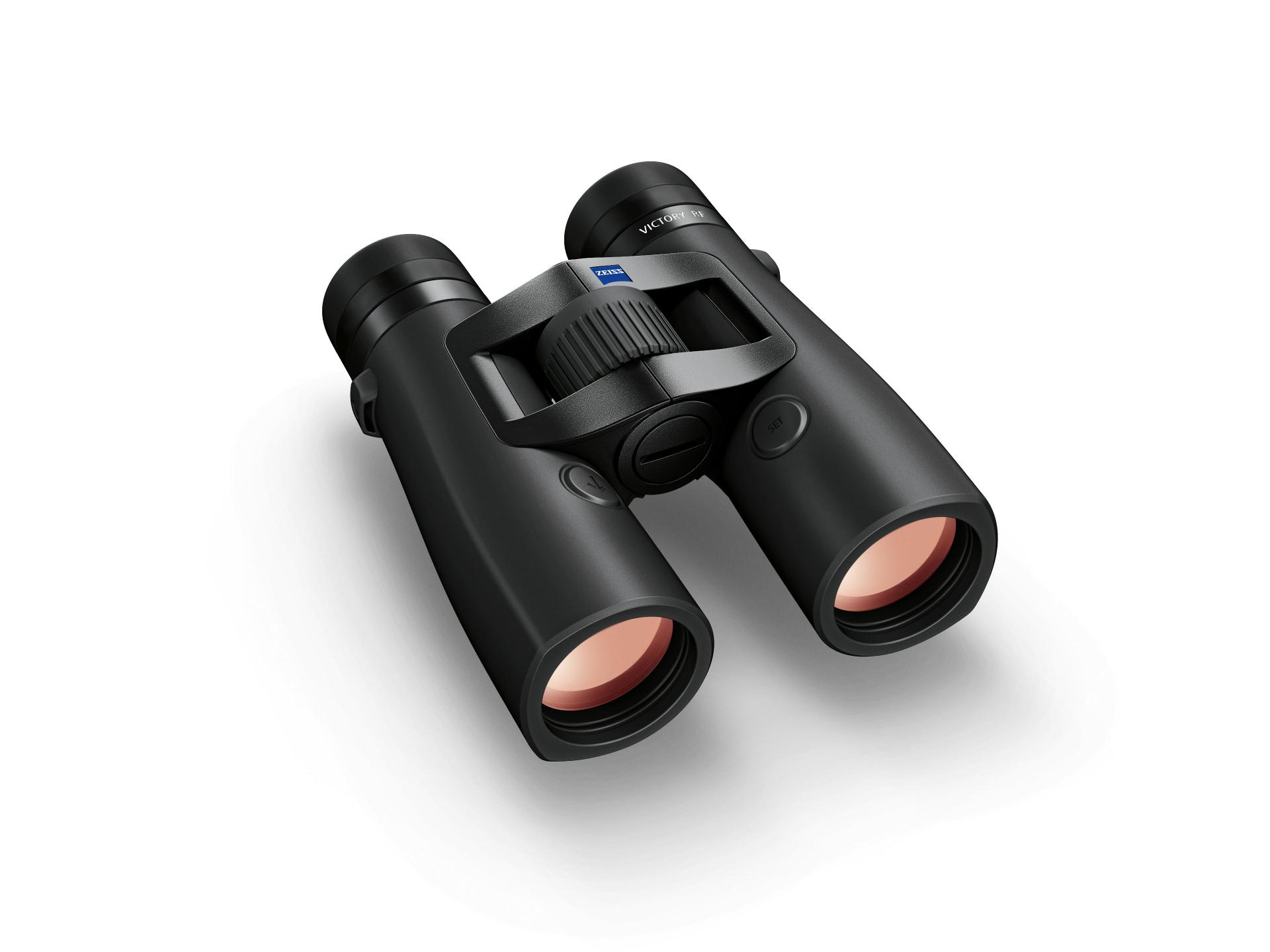 Black ZEISS binoculars with a central focusing wheel and red-tinted objective lenses displayed on a white background.