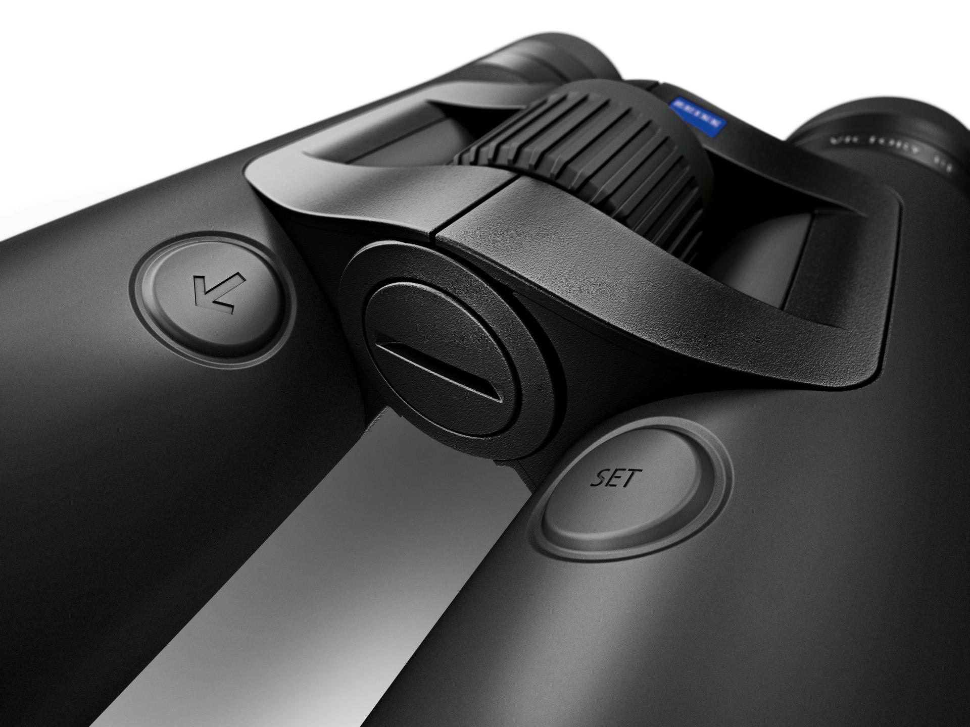 Close-up view of a ZEISS binocular featuring a central focus wheel and two control buttons labeled with arrows and "SET".
